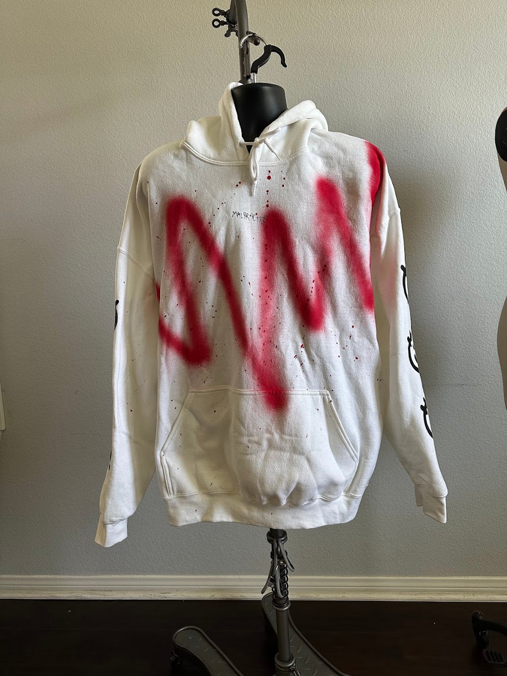 White Graphic Hoodie Red Spray Paint Smile Sleeve Print